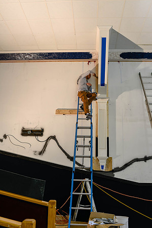Week 5: Painting the corbels; lower wall covering installed (May 22, 2015)